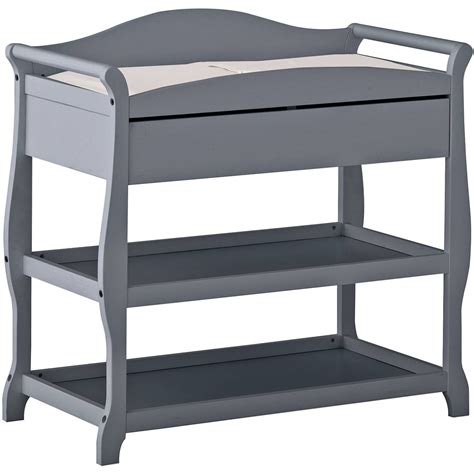 In addition to the <b>changing</b> <b>table</b> topper, the <b>Storkcraft</b> Modern Nursery <b>Changing</b> <b>Table</b> Dresser features 2 spacious drawers (complete with Euroglide drawer tracks and durable steel hardware), 2 open storage shelves, and an enclosed storage cabinet with 2 adjustable-height shelves inside. . Storkcraft changing table